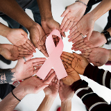 Breast Cancer Ribbon in Hands_ACCCBuzz_Square