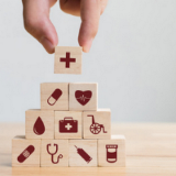 Hand Stacking Healthcare Items_ACCCBuzz_Square