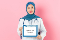 Lead by Example_Woman Holding Sign