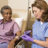 Nurse-giving-patient-injection-570x570